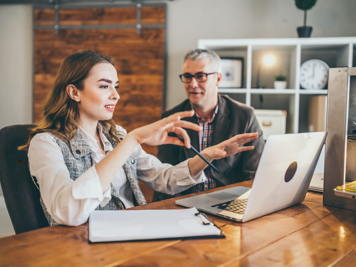 A NEXESIO consultant coaching a candidate one-on-one